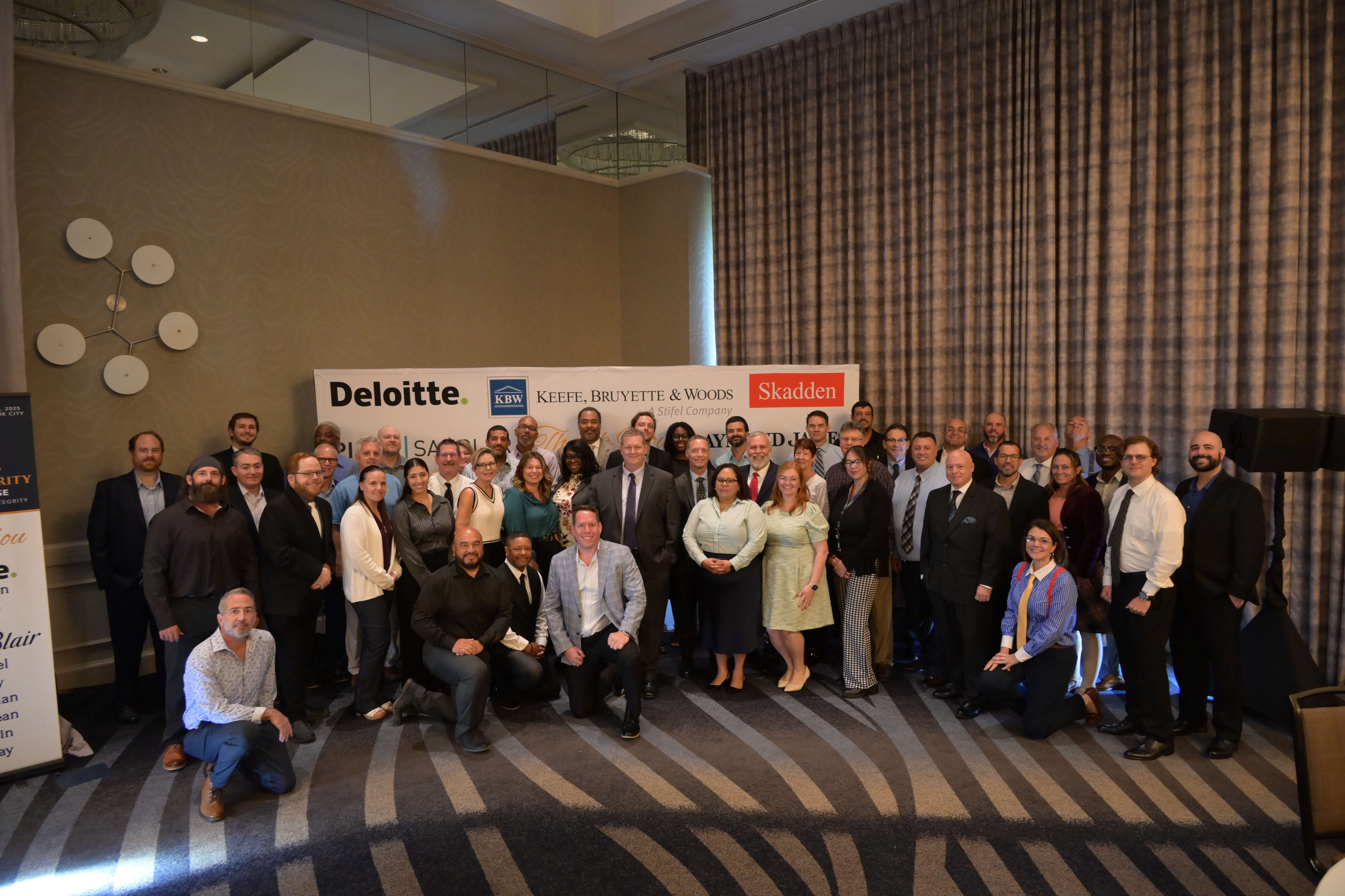 A photo of the American Integrity Claims Team from the August 2025 Town Hall event.